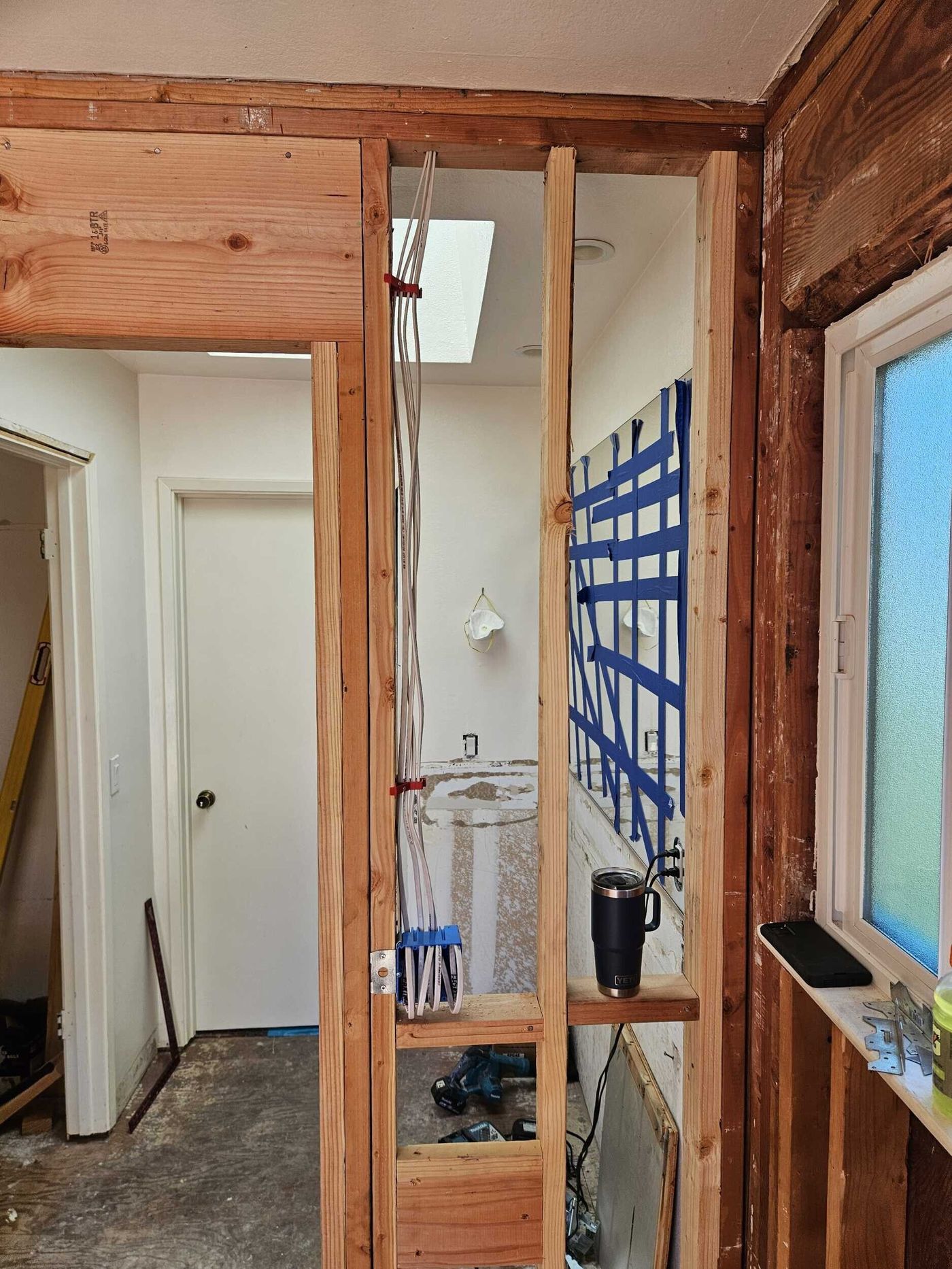 Interior rough-in wiring during a whole-home rewire