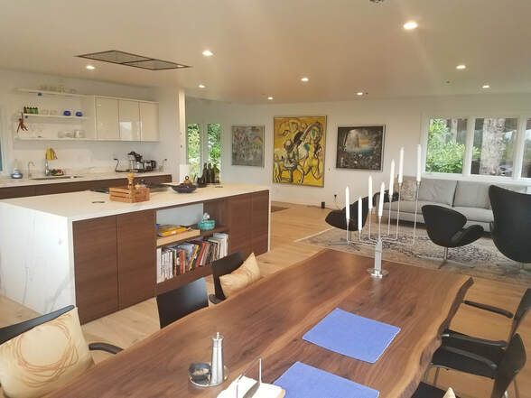 Finished living space with recessed lighting installed by Esquared Electric